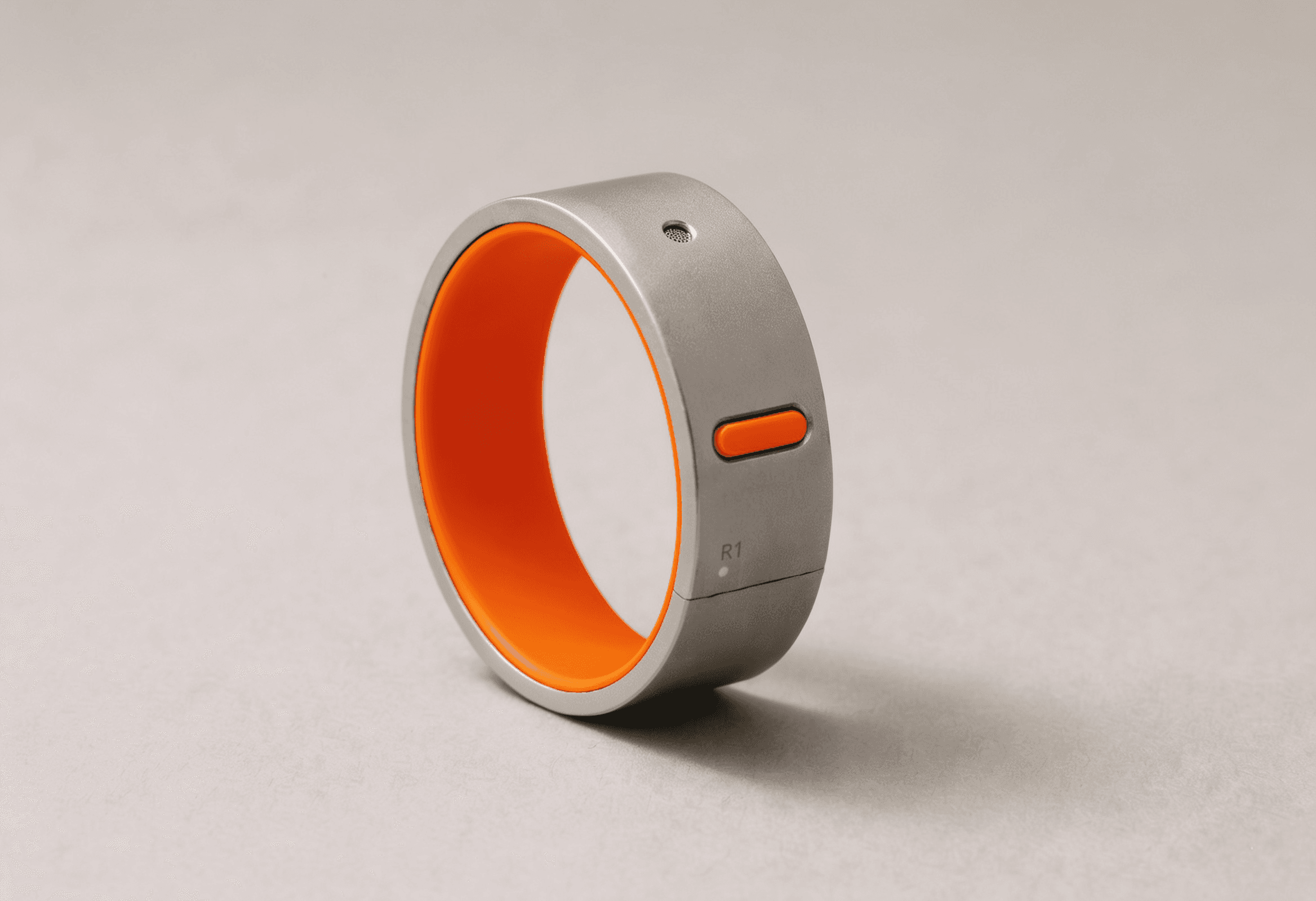The Rhyme Devices R1 in the Orange / Silver colorway