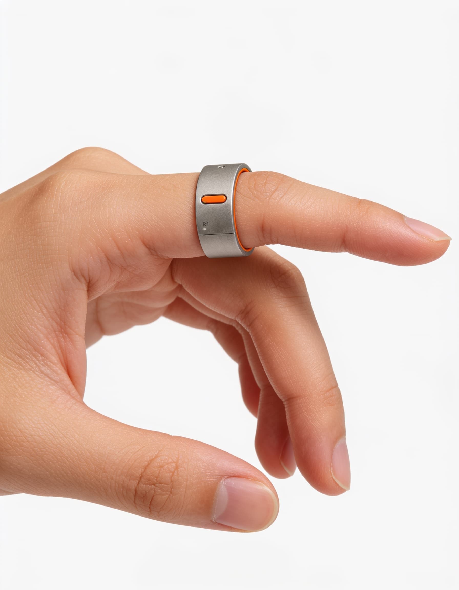A hand wearing the Rhyme Devices R1 ring on the index finger